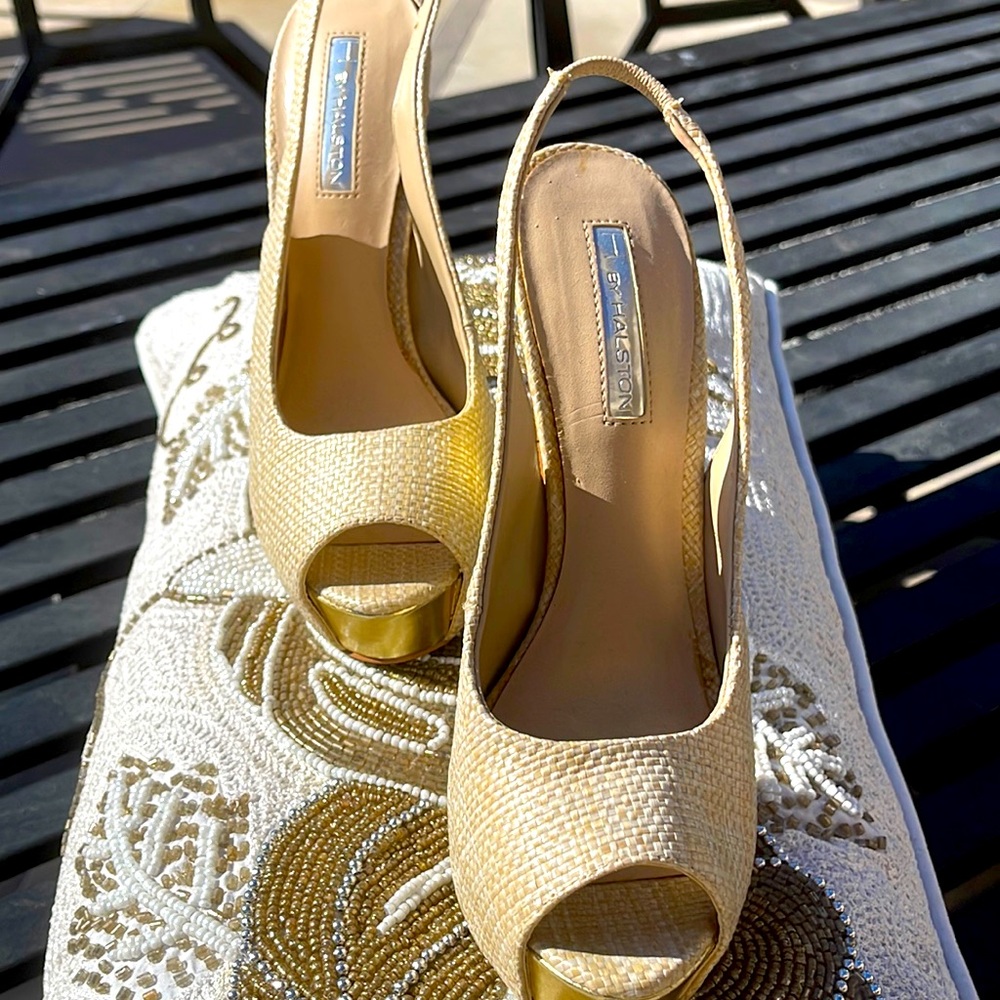 A gorgeous pair of straw woven sling bags and open toe shoes .Heels 4” high